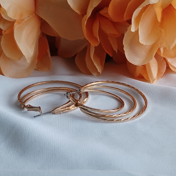 Golden Spiral Hoop Earrings - Picture 9 of 15
